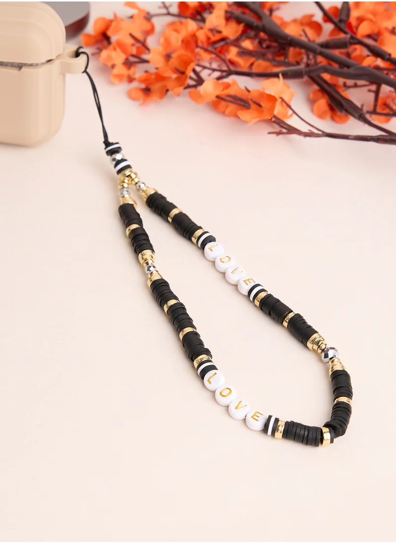 COCONUT LANE Black And Gold Phone Strap