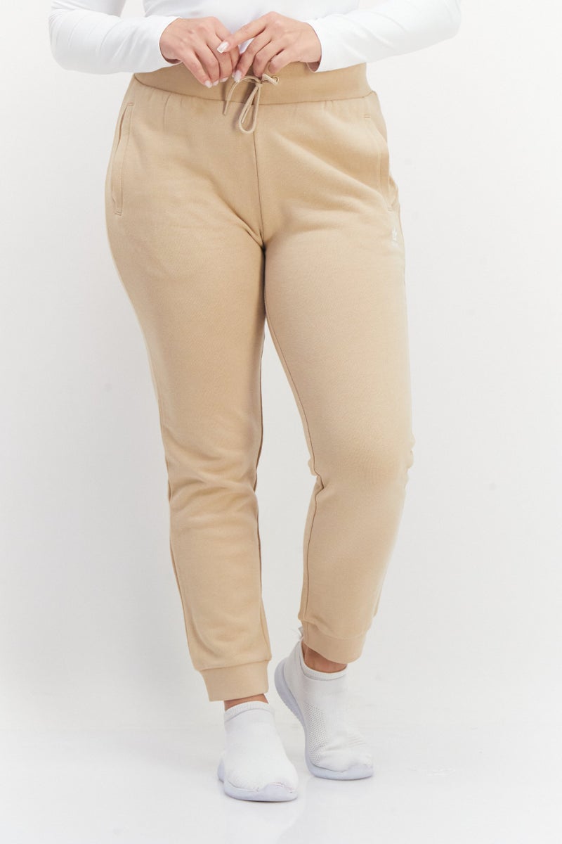 adidas Originals Women Sportswear Fit Training Sweatpants, Beige - Image 1