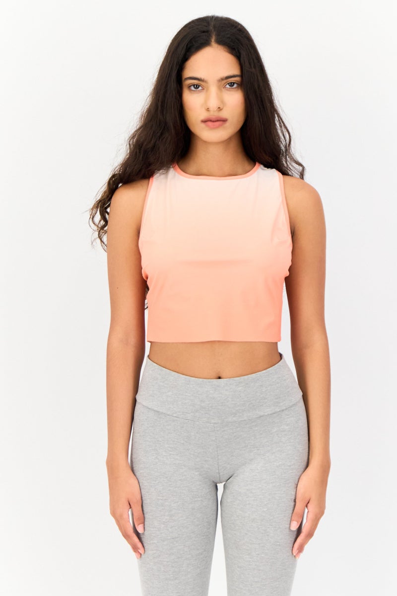 Reebok تي شيرت تدريب بلا أكمام للنساء، برتقالي - Image 1