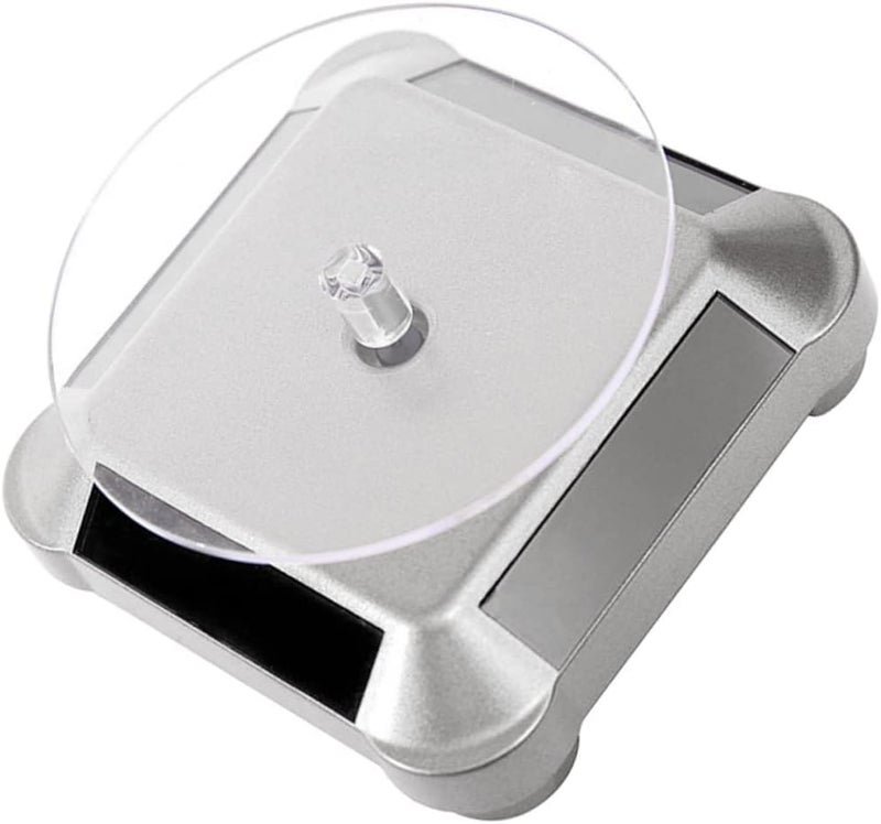 Silver Solar Rotating Display Stand For Jewelry Phones Watches Showcase - Image 1