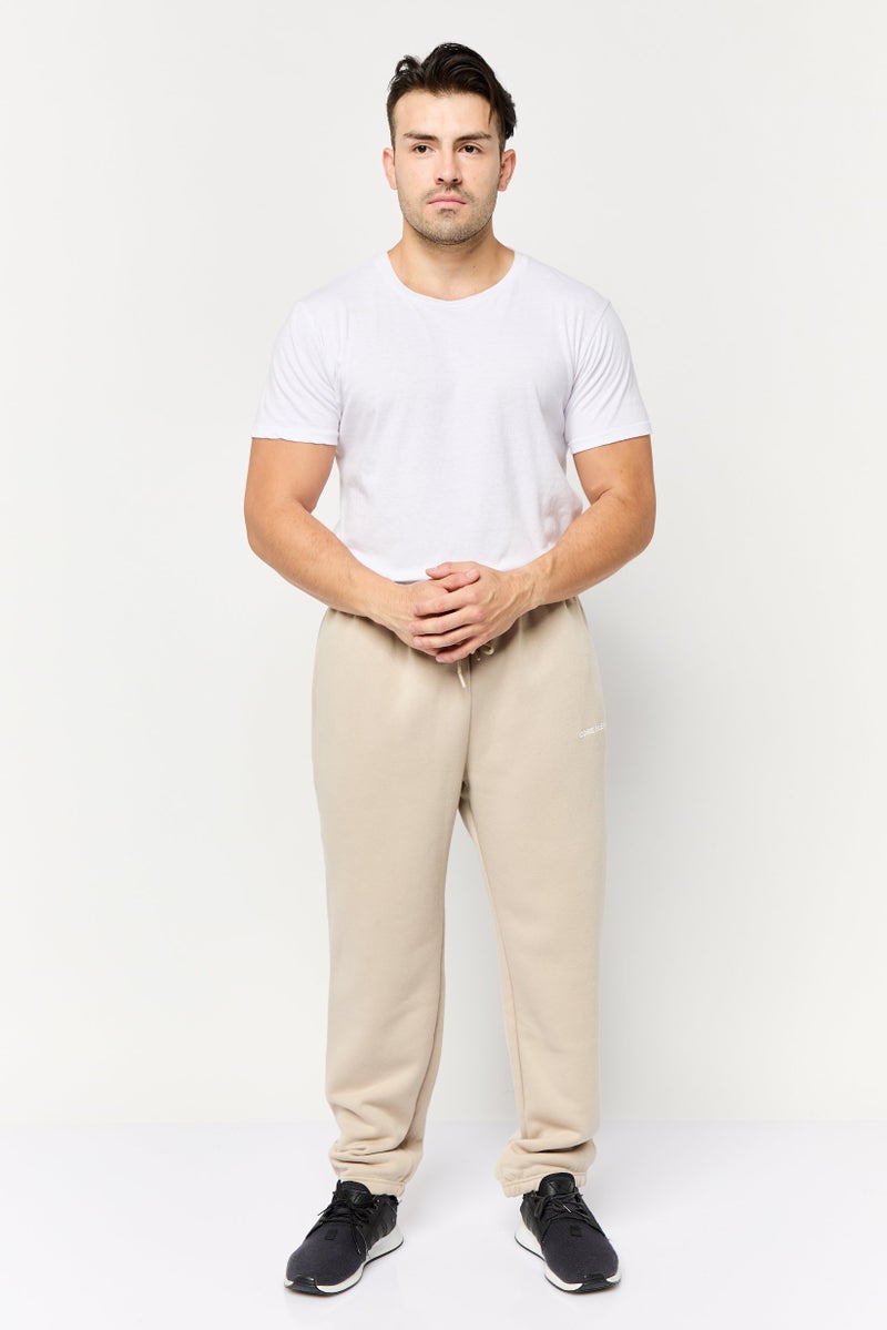 Core Elements سروال رياضي للرجال بشعار العلامة التجارية، بيج - Image 2