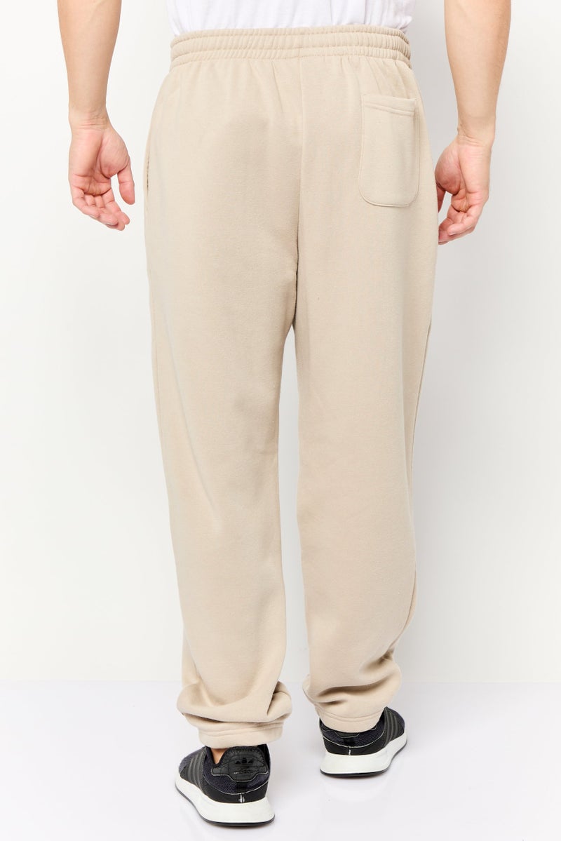 Core Elements سروال رياضي للرجال بشعار العلامة التجارية، بيج - Image 4