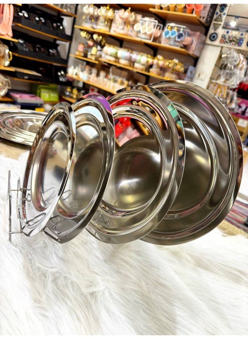 To complete your dining experience with elegance, we've brought you a 4-piece oval serving set. Made of 18/10 stainless steel with a magnetic closure. High-quality Egyptian product. 45 40 35 30 - Image 1