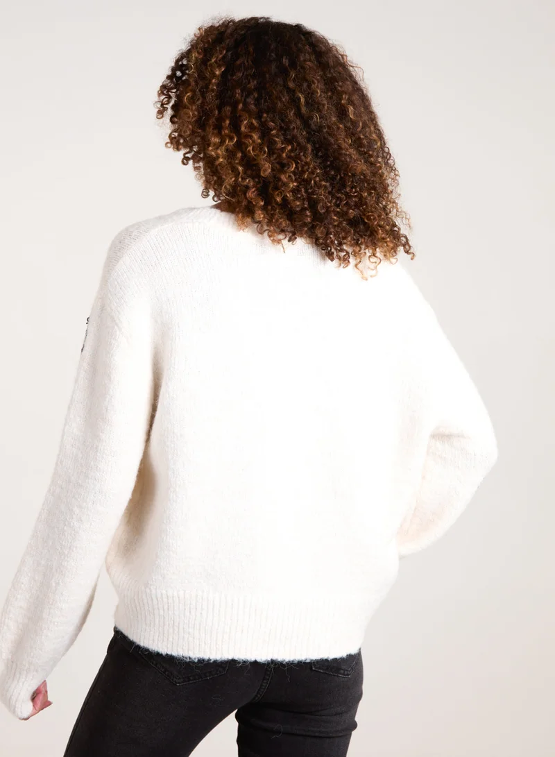 بلو فانيلا كارديجان مطرز بالزهور