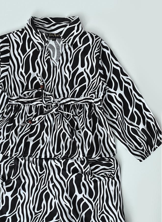 بيلا مودا طقم منسق من بنطال وبلوزة مطبعة بالكامل - Image 3