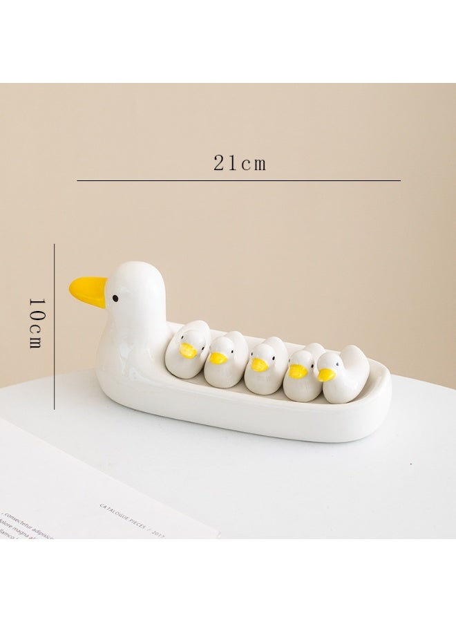 حامل عصي الطعام على شكل بطة كرتونية لطيفة، مصنوع من السيراميك، مناسب للاستخدام المنزلي، تصميم مبتكر لوضع العصا.