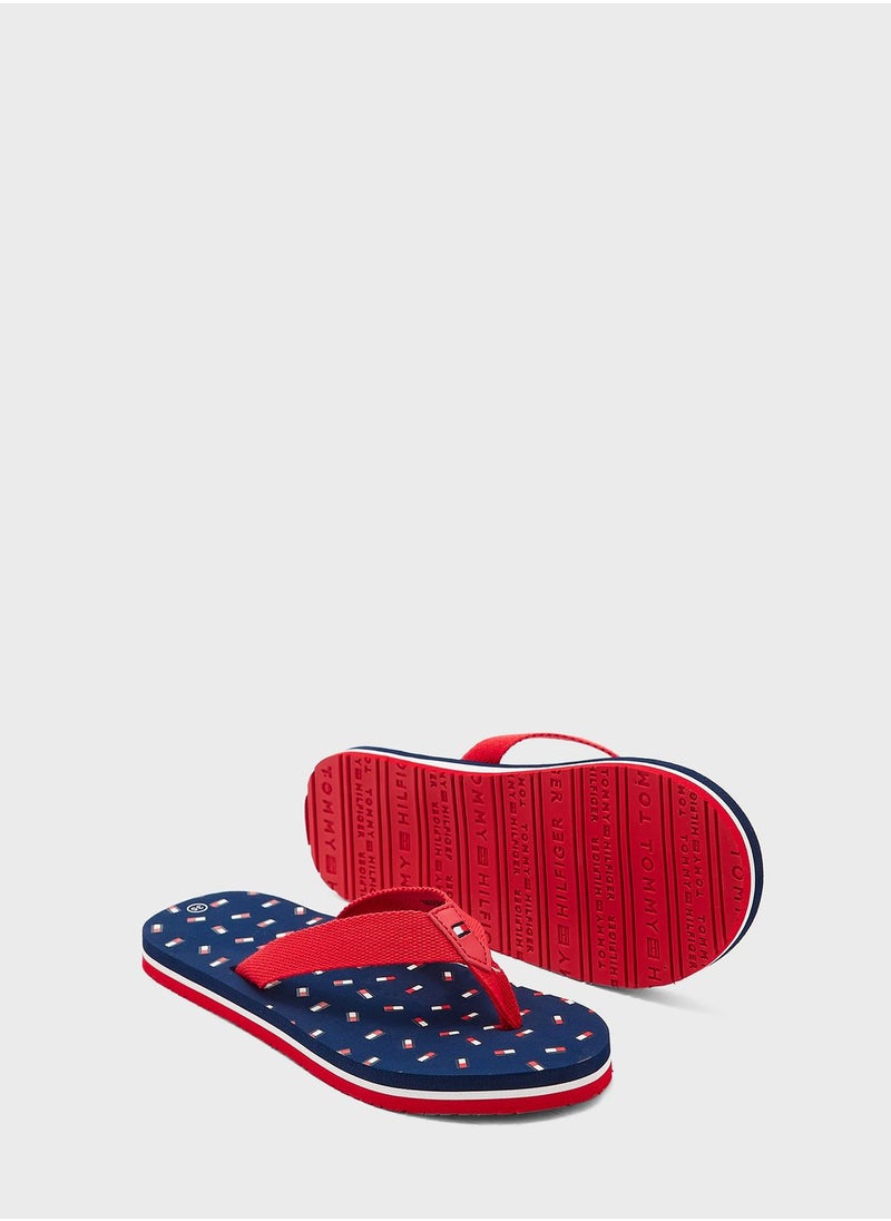 TOMMY HILFIGER - Kids Flag Flip Flops - Image 1