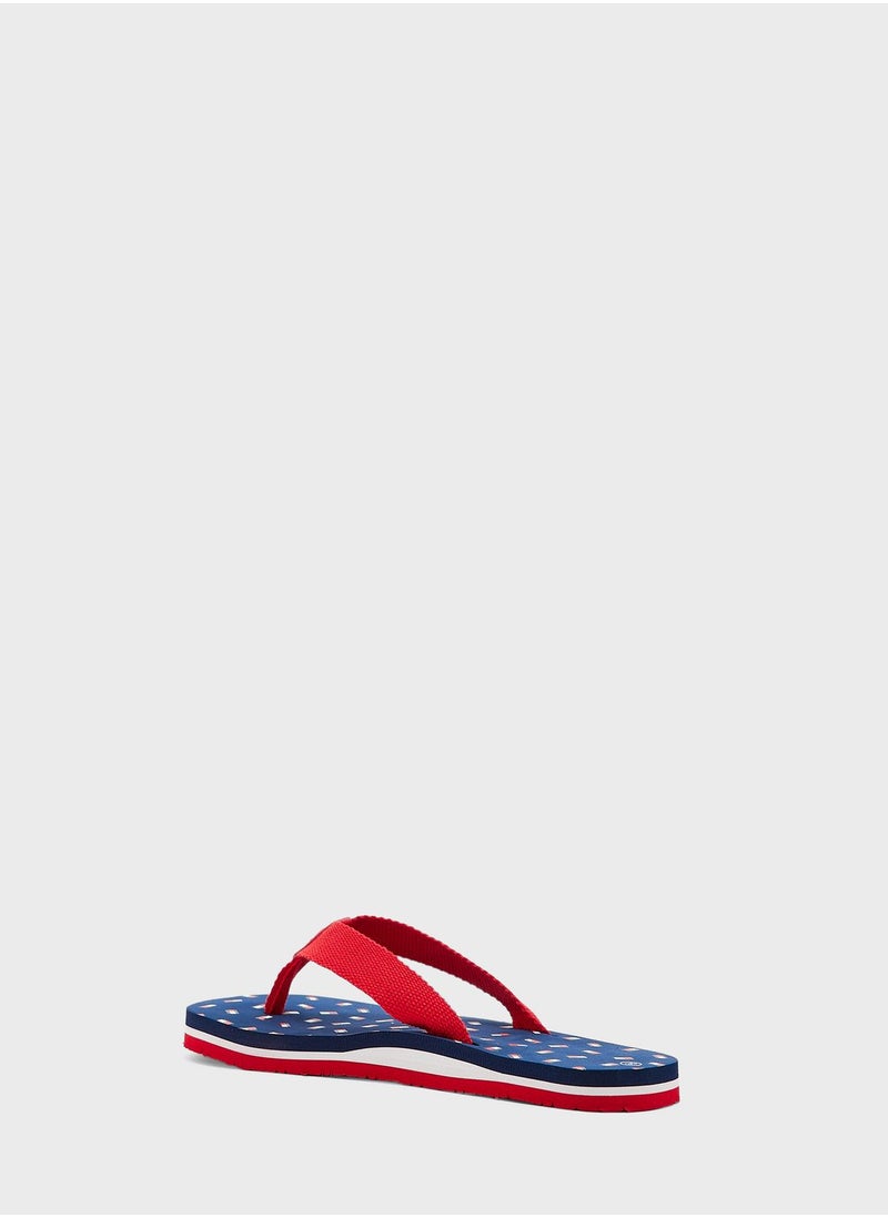 TOMMY HILFIGER - Kids Flag Flip Flops - Image 1