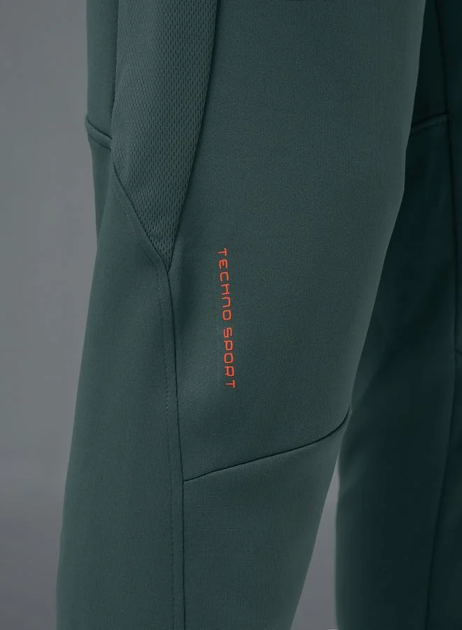 Technosport Green Green Solid Track Pants With Zip Pocket for Men | Best Price UAE