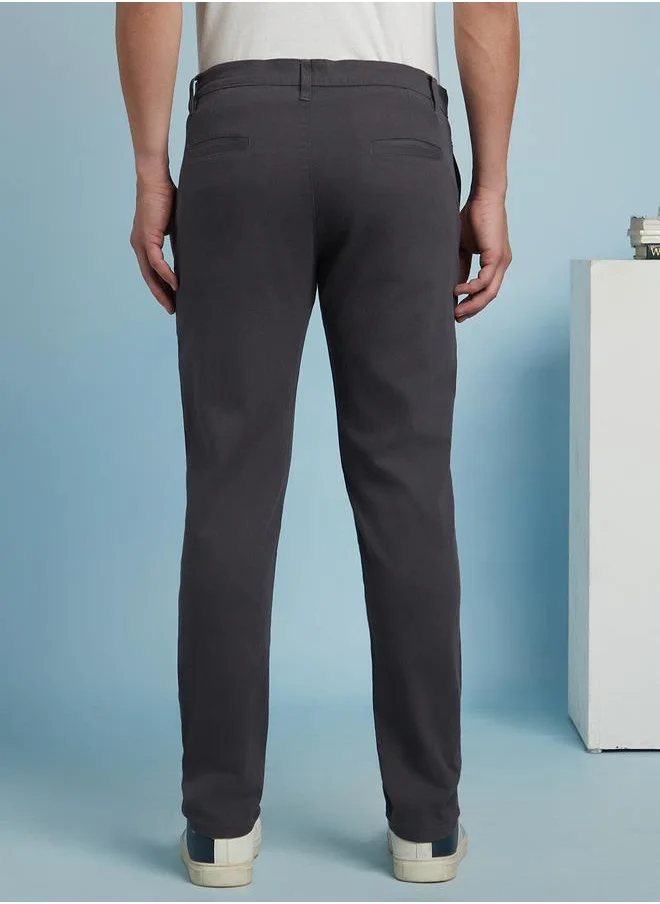 دينيس لينغو Sleek Steel Grey Slim Fit Chinos for Men featuring a mid-rise design, crafted from a durable 98% cotton and 2% lycra blend for flexibility and comfort.