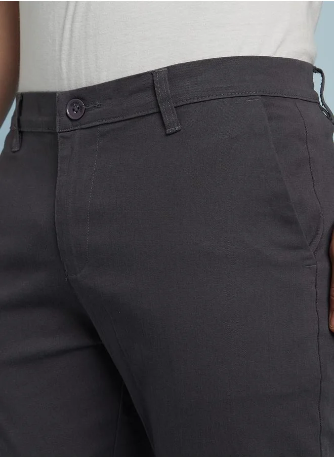 دينيس لينغو Sleek Steel Grey Slim Fit Chinos for Men featuring a mid-rise design, crafted from a durable 98% cotton and 2% lycra blend for flexibility and comfort.