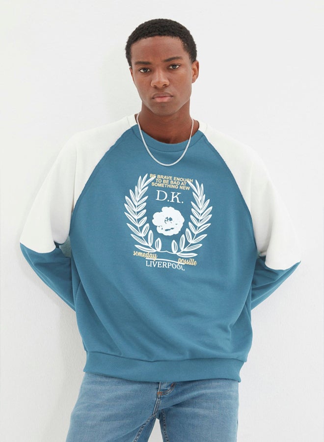 trendyol Indigo Regular Fit Raglan Sleeve Color Block Printed Cotton Unshaded Sweatshirt - Image 1
