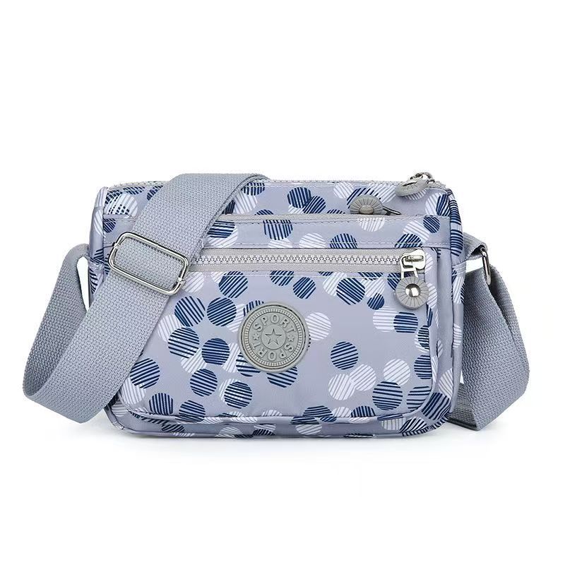 Women's Waterproof Nylon Multi-layer Crossbody Bag with Large Capacity - Image 1