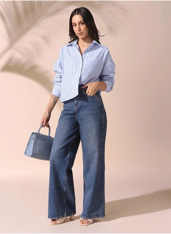 Dennis Lingo Women indigo relaxed fit solid 98% cotton 2% spandex jeans with button & zip closure- a fresh take on timeless style.