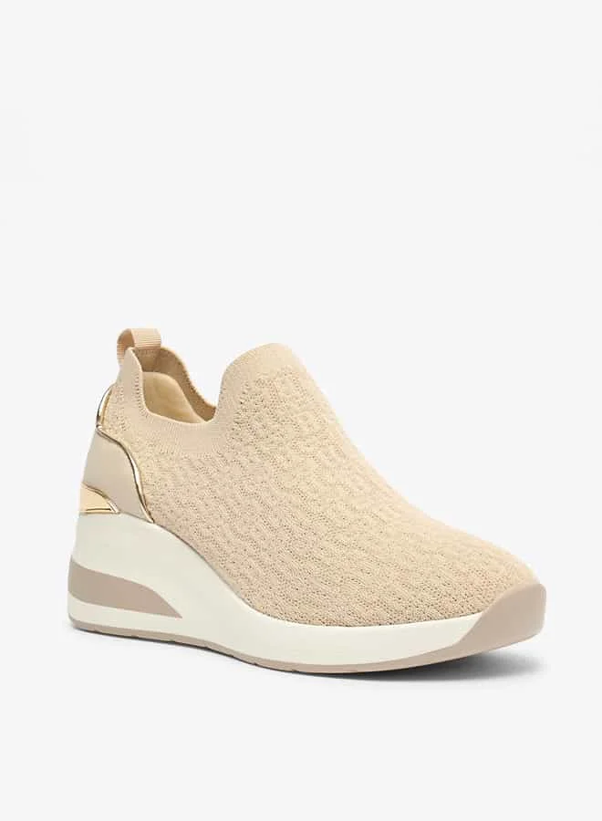فلورا بيلا من شو إكسبرس Women All-Over Monogram Textured Slip-On Low Ankle Sneakers