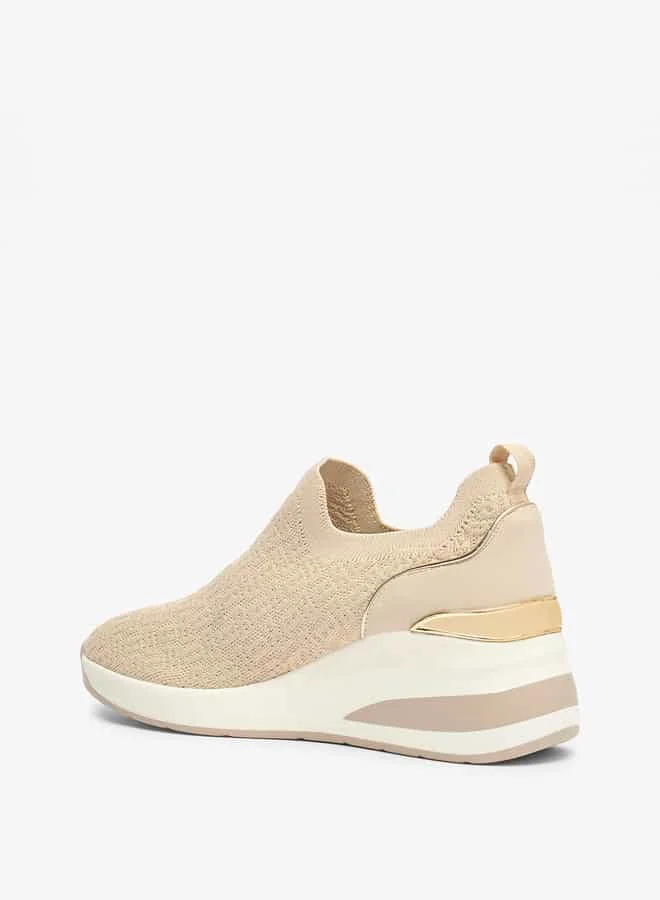 فلورا بيلا من شو إكسبرس Women All-Over Monogram Textured Slip-On Low Ankle Sneakers