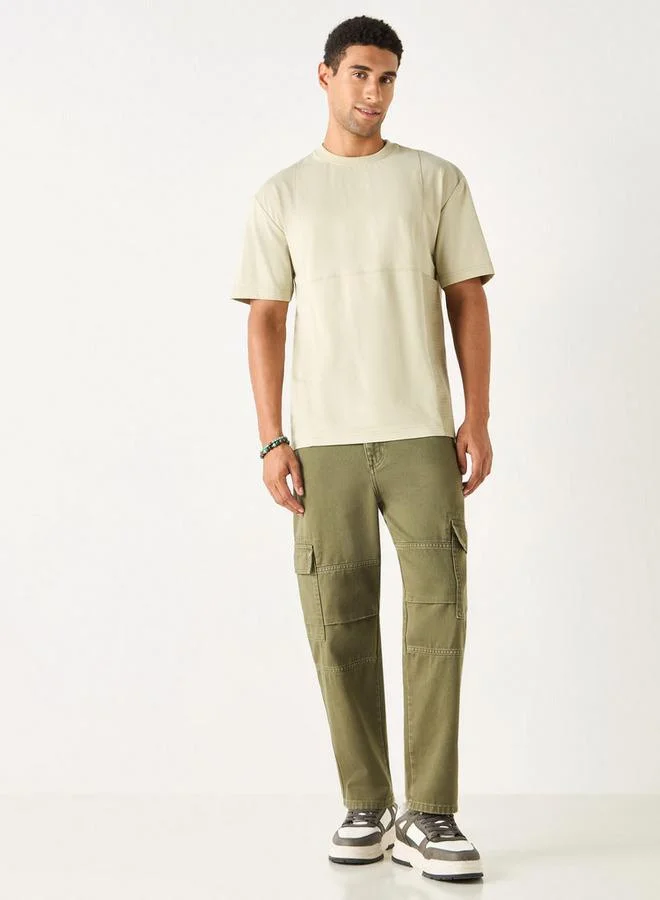 لي كوبر تيشيرت بارز الملمس بياقة ضيّقة وتصاميم مغايرة من لي كوبر