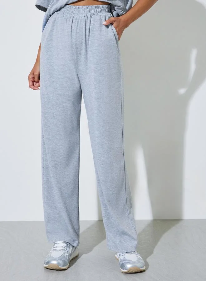 Styli  Grey Relaxed Fit T-Shirt and Wide Leg Joggers Co-ord Set for Women | Best Price UAE