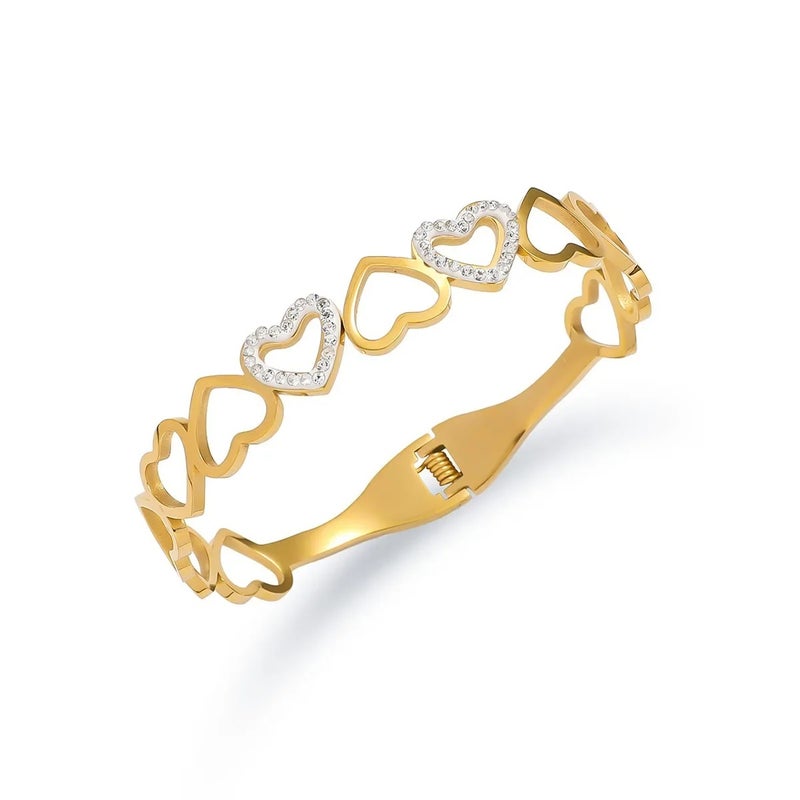 أسورة استناليس ستيل ذهبي شكل قلب مرصعة بفصوص الزيركون