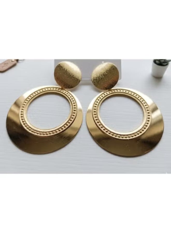 Luxuria These earrings feature a geometric design that combines a narrow top disc and a large circular hoop with engraved or etched details, giving them a classic yet modern touch. - Image 3