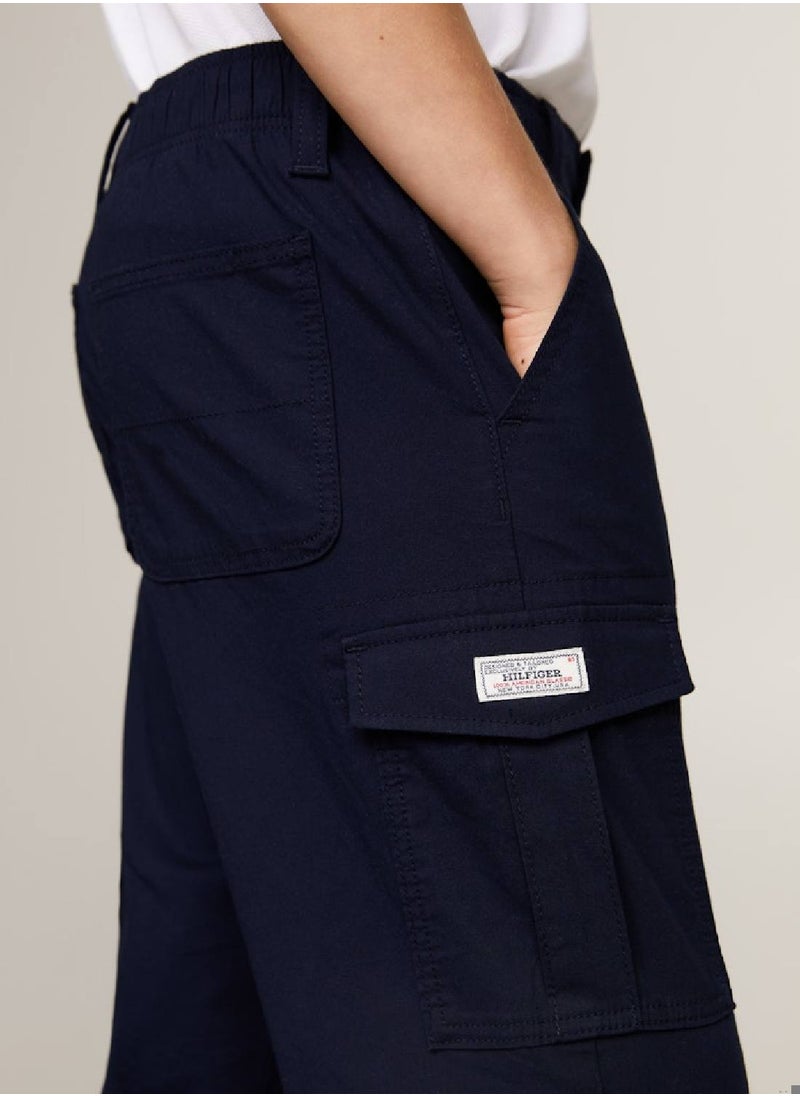 TOMMY HILFIGER - Boys' Hilfiger Monotype Straight Leg Cargo Trousers -  Stretch organic cotton, Blue - Image 1