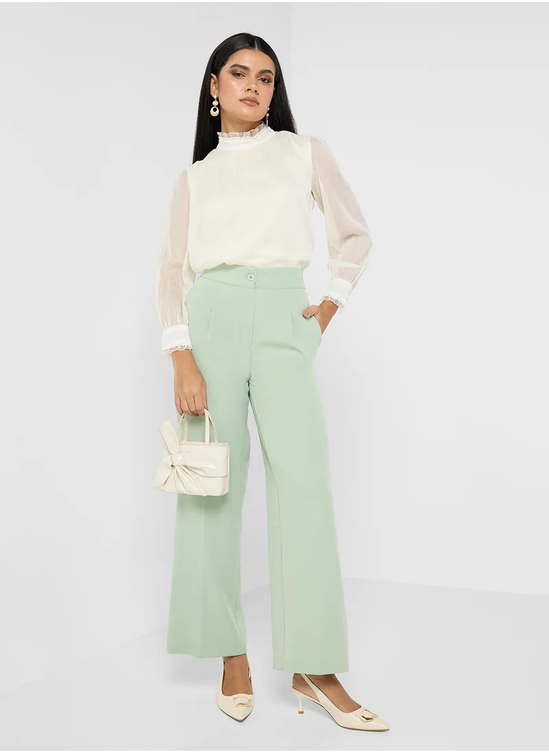 ايلا High Neck Top With Baby Ruffle