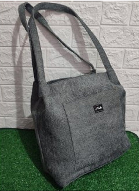 A chic women's bag with an attractive and elegant shape, gray in colour