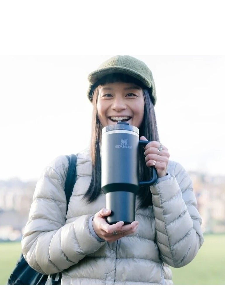 Stanley - Quencher H2.0 FlowState Vacuum Insulated Tumbler – 40 oz Black Stainless Steel Travel Mug with Leakproof Lid and Reusable Straw – Double-Walled, Durable & BPA-Free – Keeps Drinks Hot for 7 Hours or Cold for 24 Hours – Eco-Friendly, Portable & Ideal for Work, Gym, or Travel - Image 1