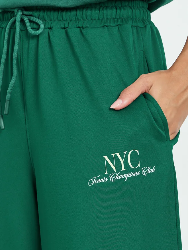 Styli green Styli Green Wide Leg Joggers with Print for Women | Best Price UAE
