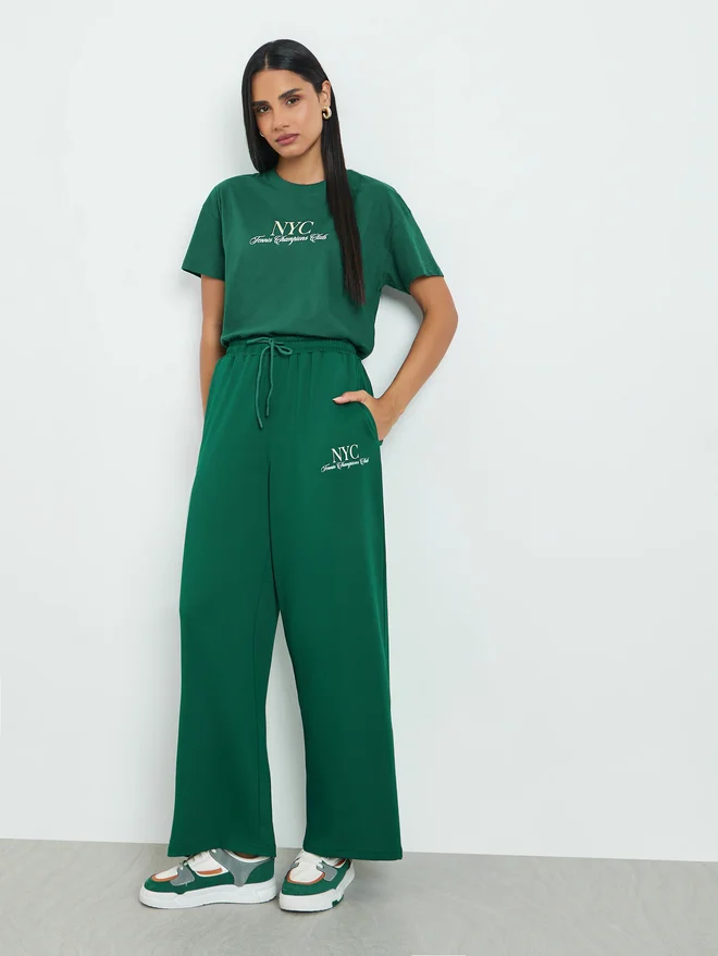 Styli green Styli Green Wide Leg Joggers with Print for Women | Best Price UAE
