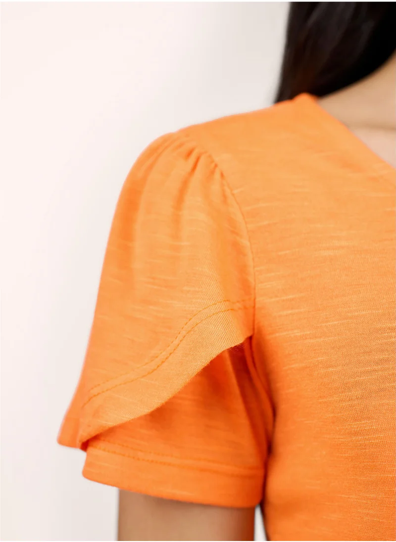 سولت اتاير Vibrant Orange Scoop Neckline Top with Chic Half Length Petal Sleeves in Regular Fit Perfect for Adding a Splash of Color to Your Everyday Style