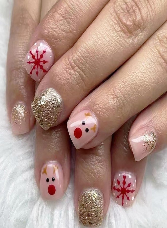 BYJKYEN 24Pcs Christmas Press on Nails Short Square Fake Nails Snowflake Cute Reindeer Design with Gold Glitter Nude False Nails Holiday Nail Art Press on Nails Fake Nails for Xmas Acrylic Stick on Nails Set - Image 1