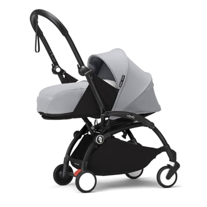 YOYO3 Baby Stroller for newborns: black aluminum frame with stone-colored fabric, ultra-soft mattress, five-point harness, extendable UV50+ canopy, padded shoulder strap, and protective storage bag - Image 1