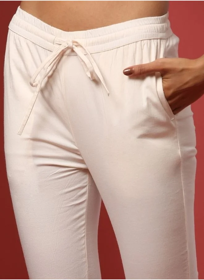Abhishti Fitted narrow  stretch pants with slits- offwhite