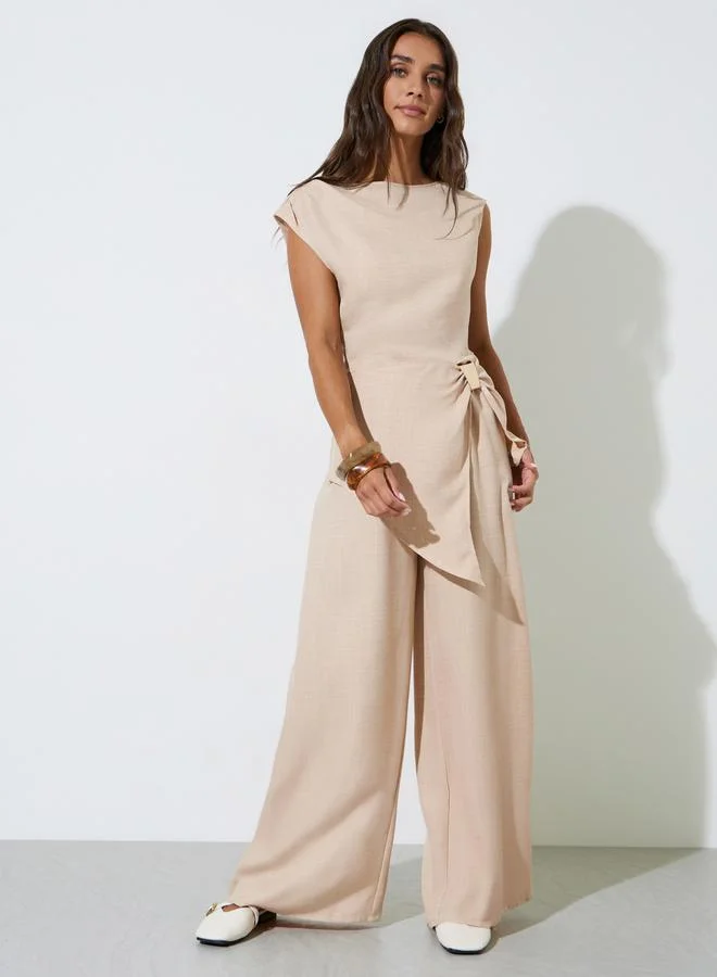 ستايلي Beige Textured Sleeveless Blouse and Wide Leg Trousers Co-Ord Set