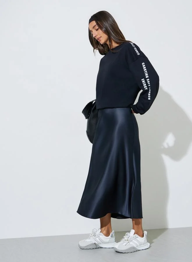 Styli  Black Longline Slogan Sweatshirt for Women | Best Price UAE