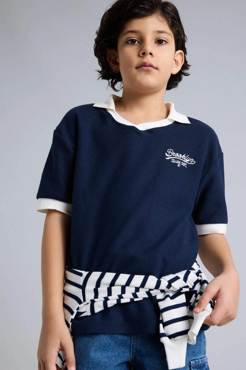 ديفاكتو Oversize Fit Short Sleeve Polo T-Shirt