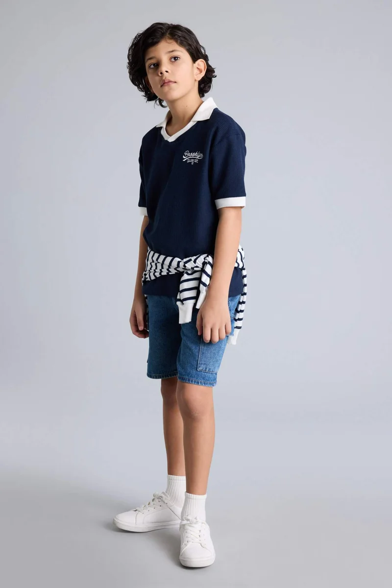 ديفاكتو Oversize Fit Short Sleeve Polo T-Shirt