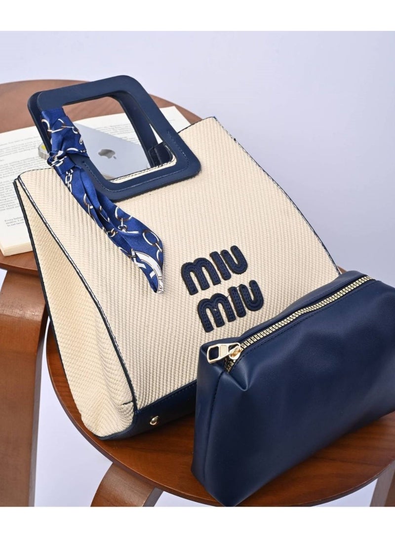 مياو مياو حقيبة يد نسائية لون بيج وأزرق غامق