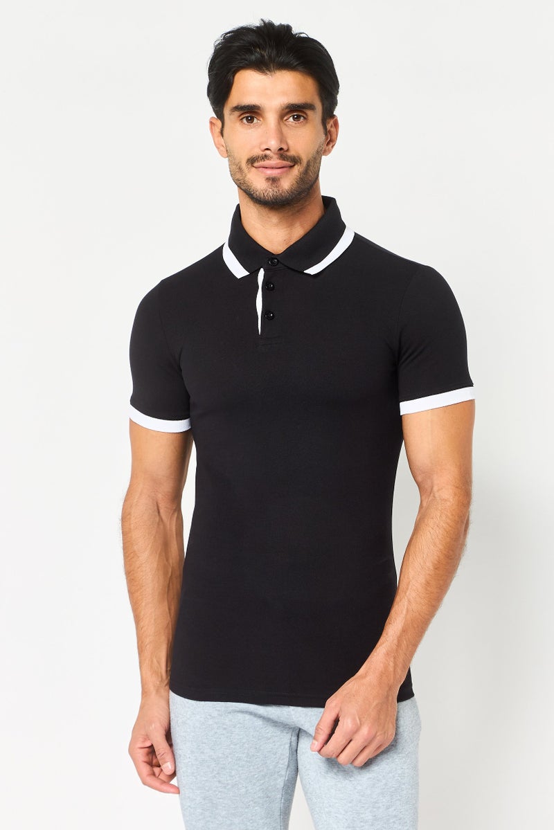 PUMA Men Sportswear Fit Short Sleeve Outdoor Polo Shirt, Black - Image 1