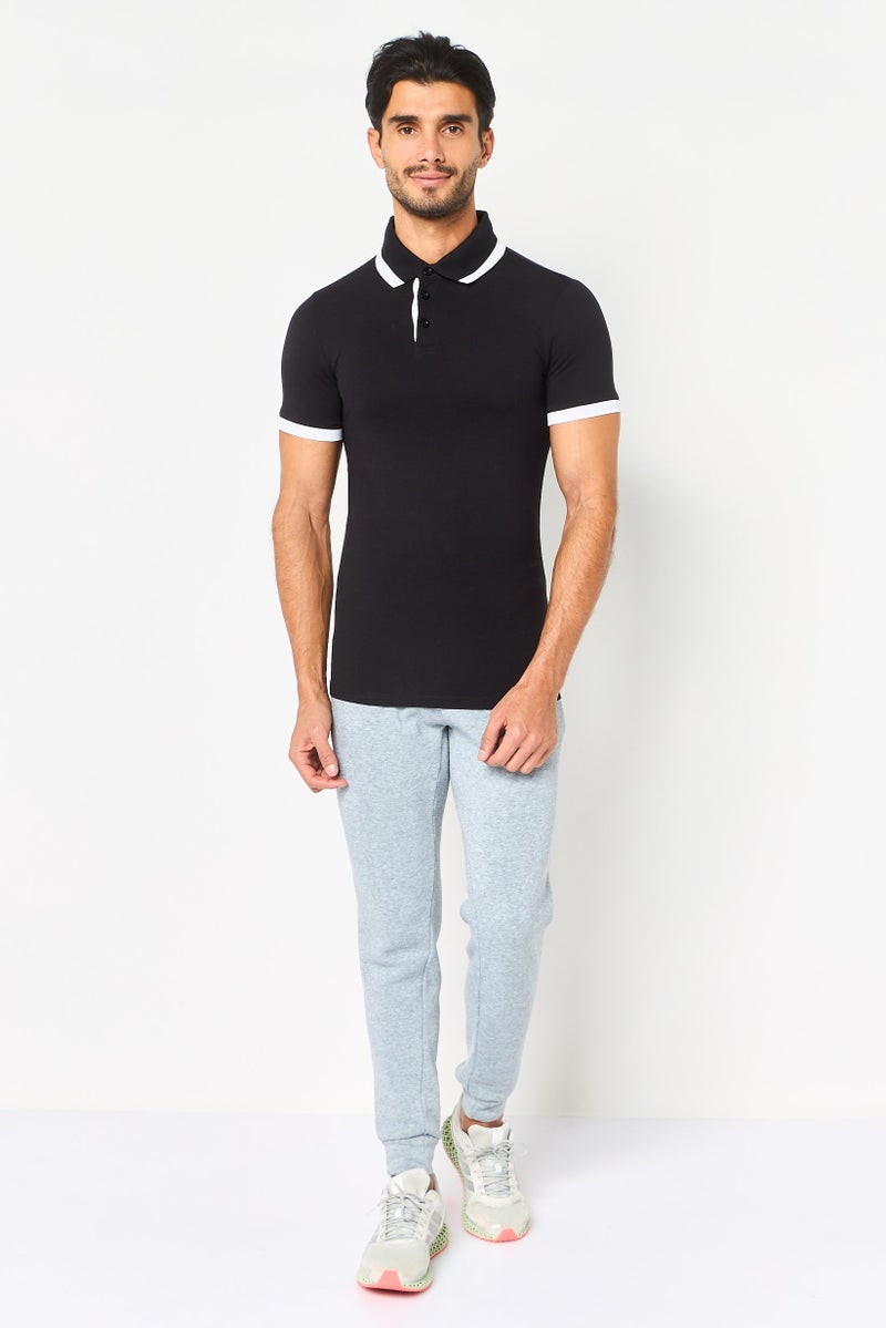 PUMA Men Sportswear Fit Short Sleeve Outdoor Polo Shirt, Black - Image 4