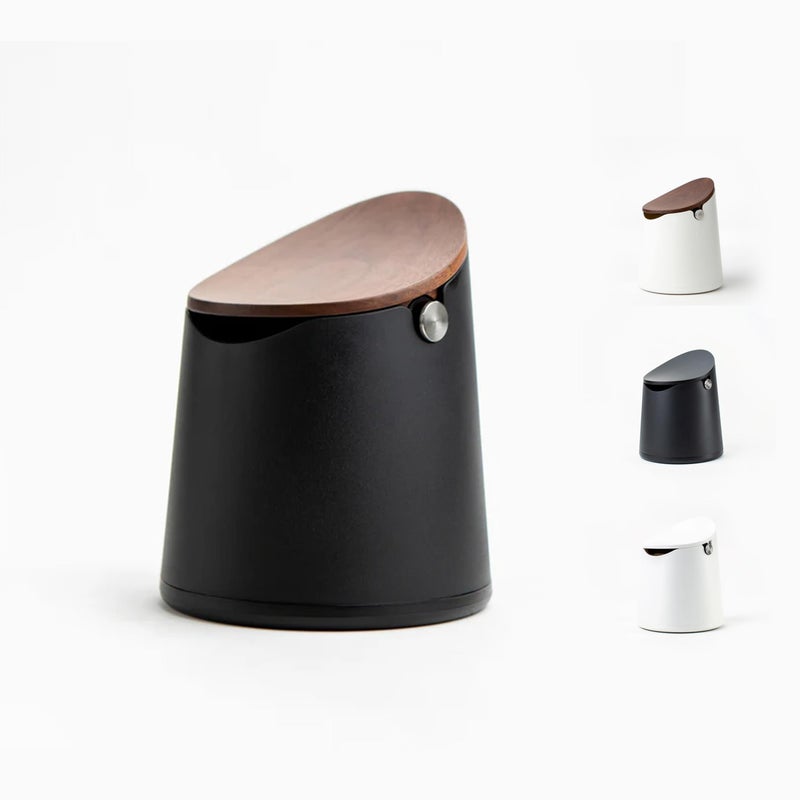 CREMA Coffee Products Arc Knock Box  Holds 1216 Espresso Pucks DurableStainResistantBuild withNonSlip BaseElegant WalnutPlastic Lid Design EasyCleanUp Moisture ControlBlack Finish