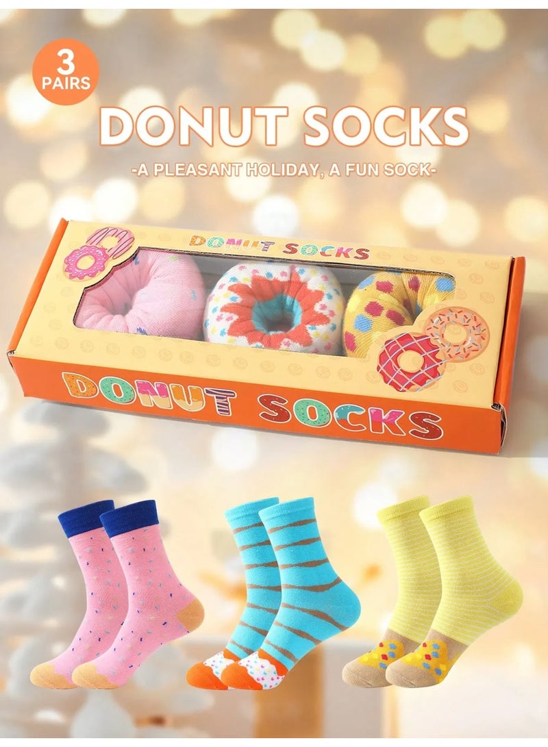 جوارب شتويه طويله مجموعه من 3 ازواج بتصميم ملفت للانظار مستوحى من الدونات تأتي  بتغليف مبتكر على شكل علبة دونات جوارب بالوان زاهيه مصنوعه من قماش ناعم و تحافظ على دفء القدمين في الأجواء الباردة. - Image 1