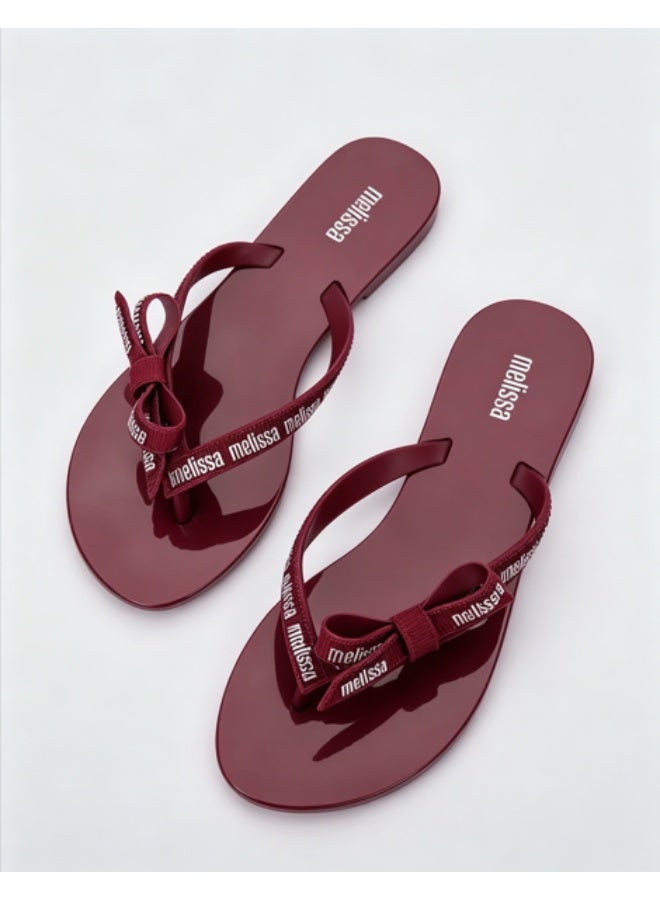 Melissa Flat Minimalist Bow Letter‑Print Flip‑Flops for Women - Image 1
