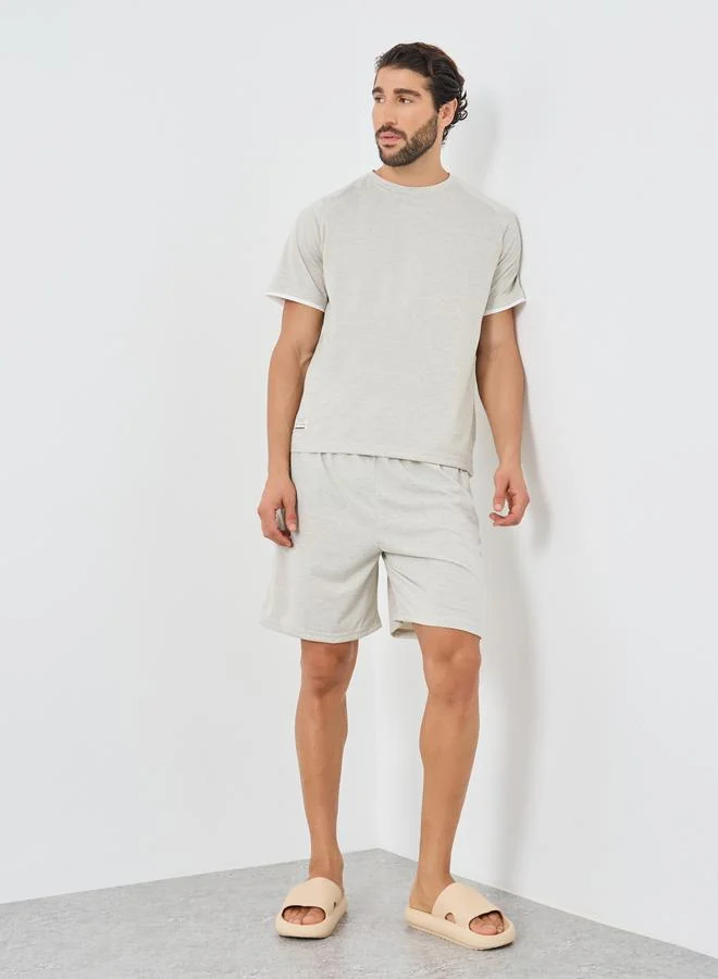 Styli Styli Grey Woven Badge Detail T-Shirt and Shorts Set