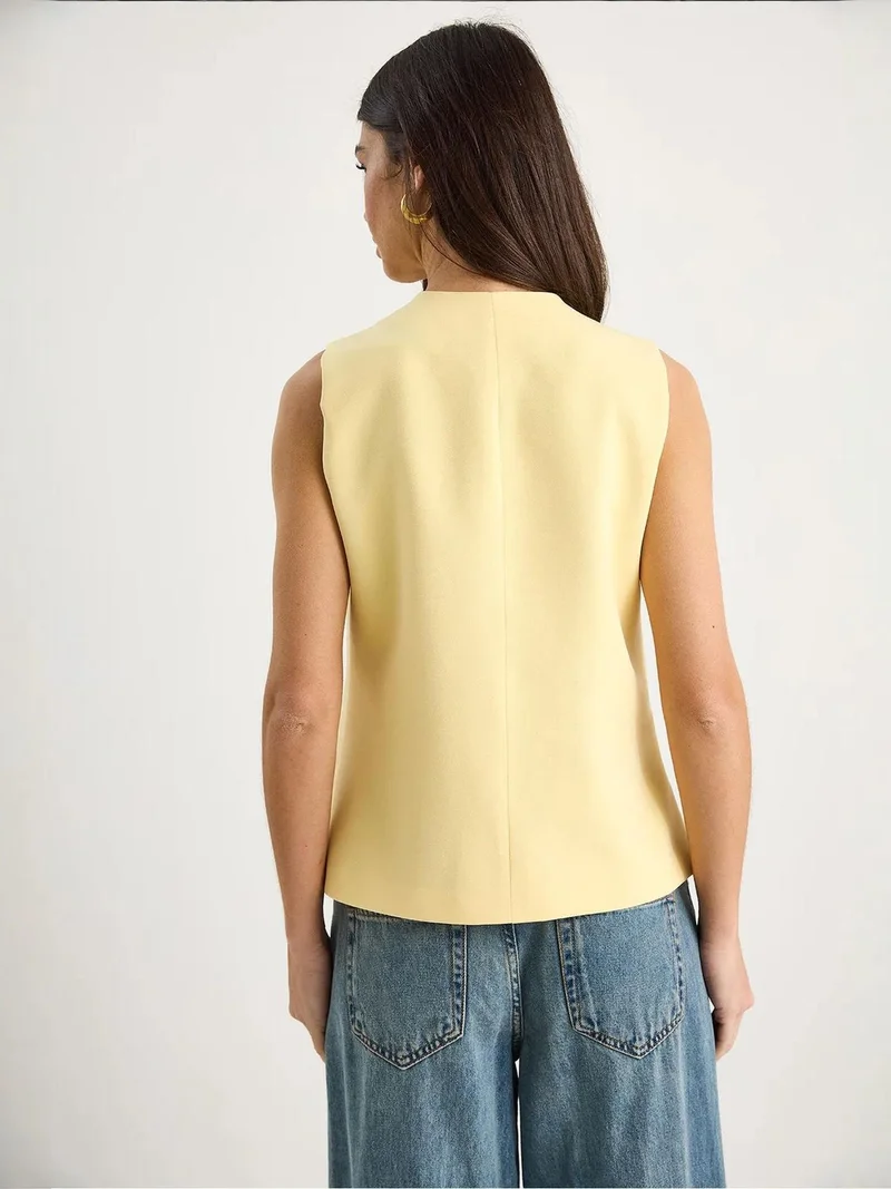 Bianco Lucci Lemon Yellow Fitted Sleeveless Button-Front Waistcoat with Crew Neck for Women | Best Price UAE