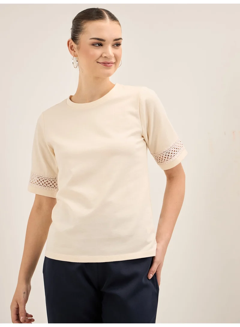 سولت اتاير Women's Elegant Off-White Round Neckline Top with Delicate Lace Insert Detail and Stylish Half Length Sleeves in Regular Fit Perfect for Effortless Sophistication and Versatile Wear Size