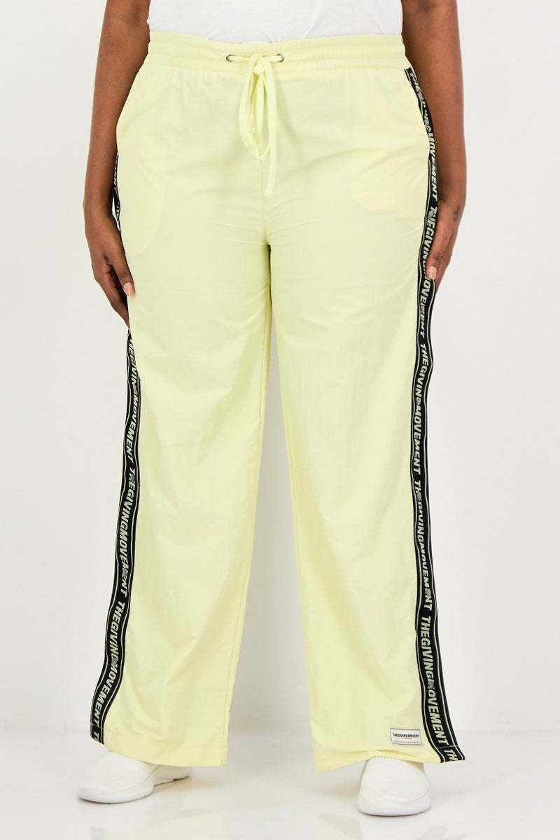 The Giving Movement Women Regular Fit Brand Logo Wide Leg Pants, Yellow - Image 1