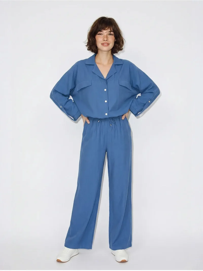 بيانكو لوتشي LUCCI Two-Piece Crepe Blouse And Wide-Leg Trousers
