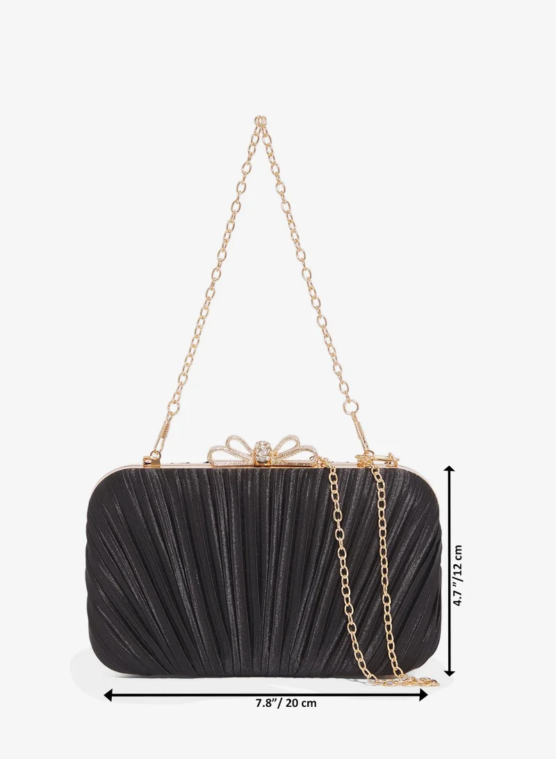 Ella Limited Edition Black Textured Clutch With Gold Accent Bow Detail for Women | Best Price UAE